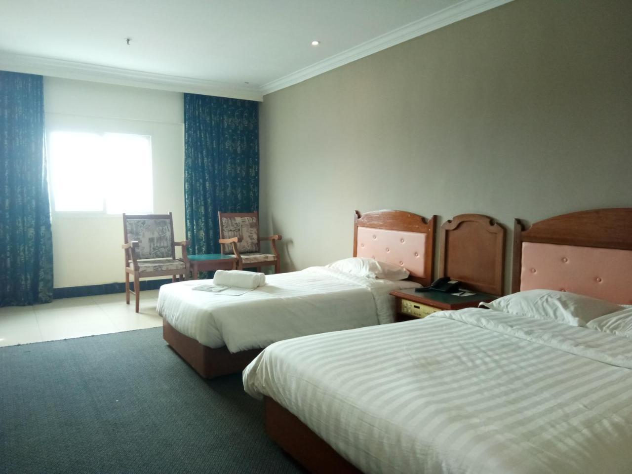 לימבאנג Purnama Hotel מראה חיצוני תמונה